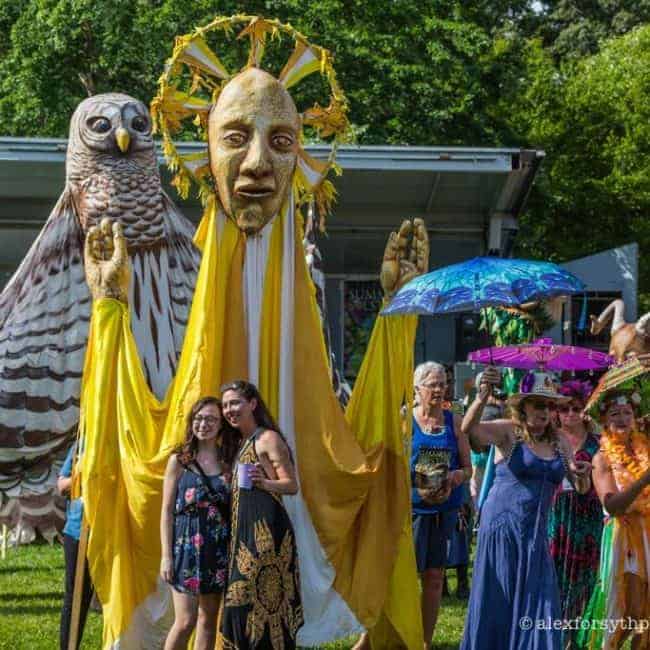 Paperhand Puppet Intervention leading parade | Imagine Circus
