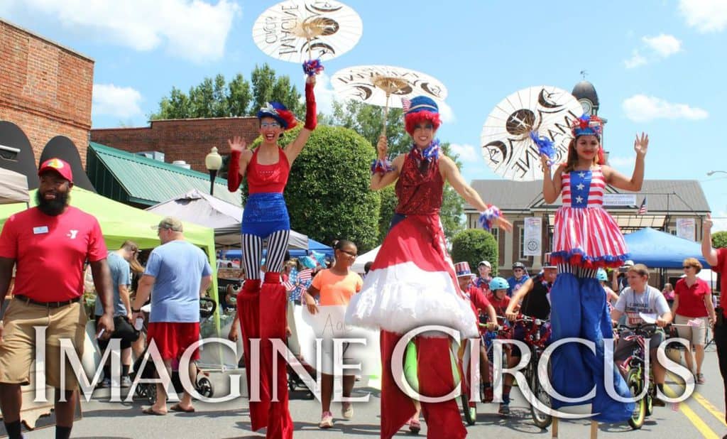 Kaci, Liz, Mari, Imagine Circus Performers at Pittsboro Summer Fest, Independence Day Parade, Stilt Walkers