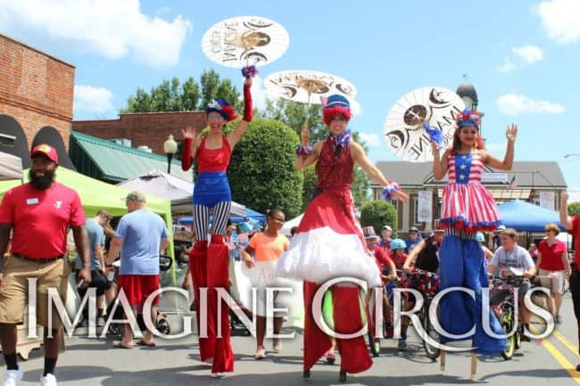 Kaci, Liz, Mari, Imagine Circus Performers at Pittsboro Summer Fest, Independence Day Parade, Stilt Walkers