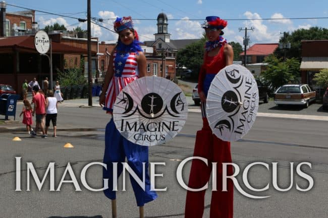 Kaci, Mari, Imagine Circus Performers at Pittsboro Summer Fest, Independence Day Parade, Stilt Walkers, Photo by Liam Kearns