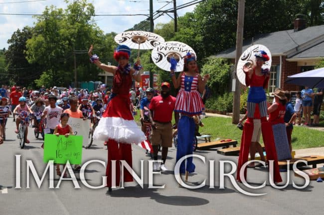 Kaci, Liz, Mari, Imagine Circus Performers at Pittsboro Summer Fest, Independence Day Parade, Stilt Walkers, Photo by Liam Kearns