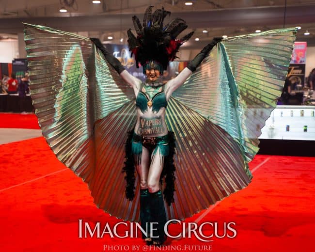 Dark Circus, Isis Wing Dancer, Tik-tok, Logo Branded Bodypaint, Vapers Carnivale, Imagine Circus Performers, Photo by Finding Future