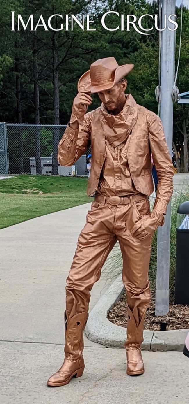 Hat Tip, Bronze Statue, Cowboy Living Statue, Imagine Circus, Performer