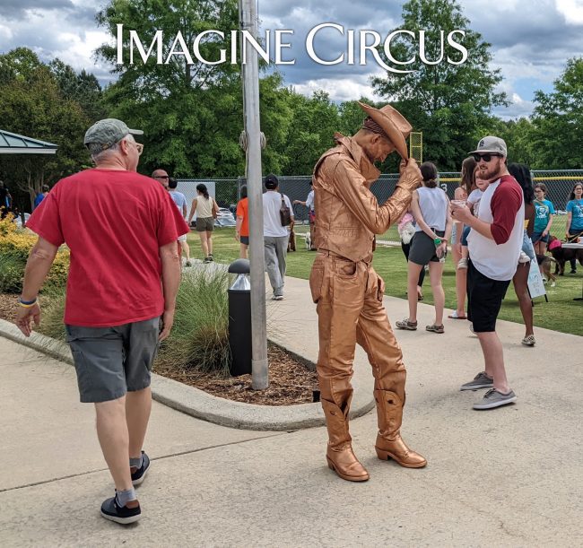 Tipped Hat, Bronze Statue, Cowboy Living Statue, Imagine Circus, Performer